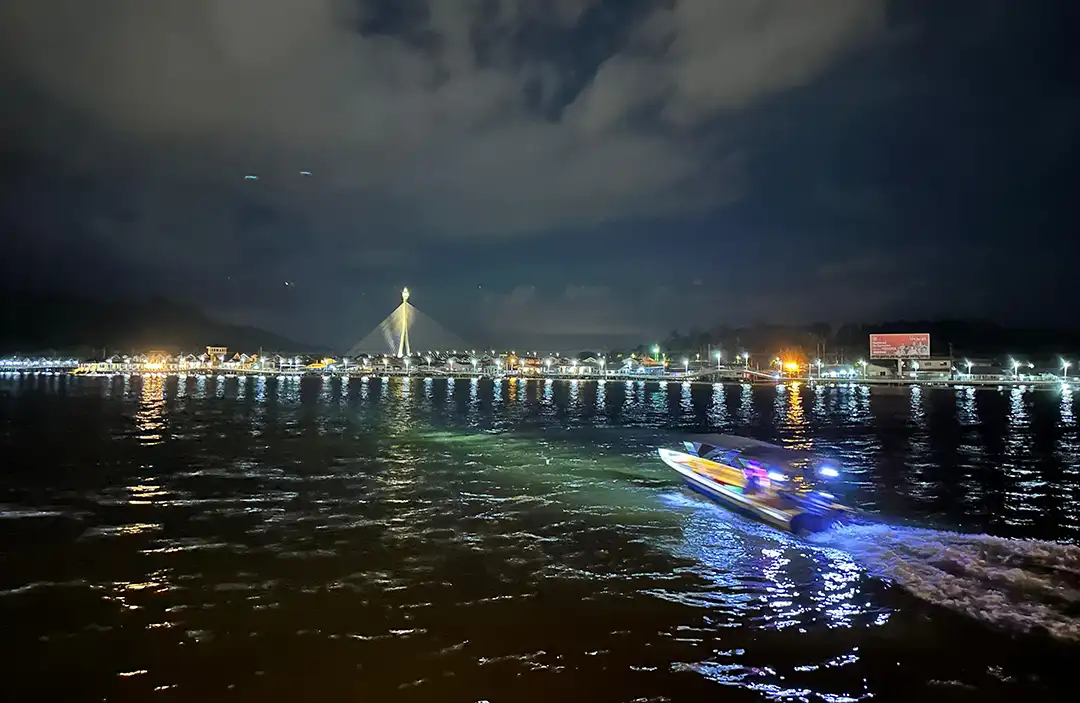 Speedboat racing at night